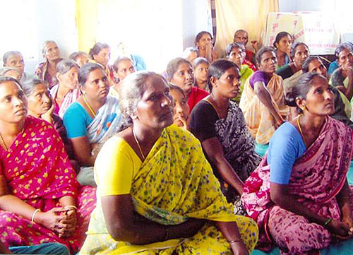 Ladies discussing Microfinance